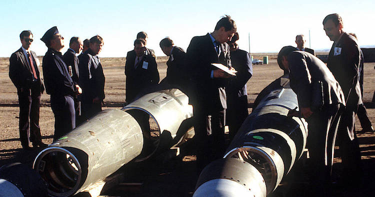 Photo: The then Soviet inspectors and their American counterparts scrutinize Pershing II missiles in 1989. Credit: Wikimedia Commons