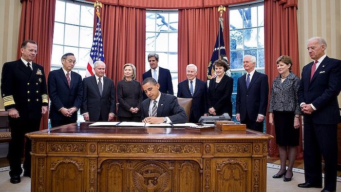 Photo: President Barack Obama signs the New START (treaty) in the Oval Office, Feb. 2, 2011 - with Vice President Joe Biden on the extreme right. Credit: Chuck Kennedy (official White House photograph)